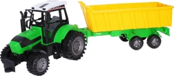Liels traktors ar piekabi