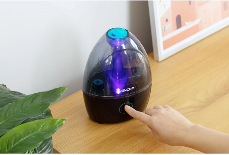 Rotating mist outlet and night light