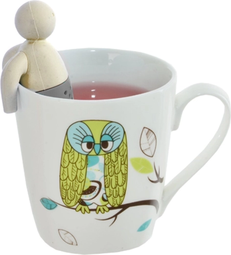 The little man holds onto the rim of the mug