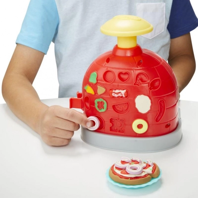 Create pizza in a fun Play-Doh oven