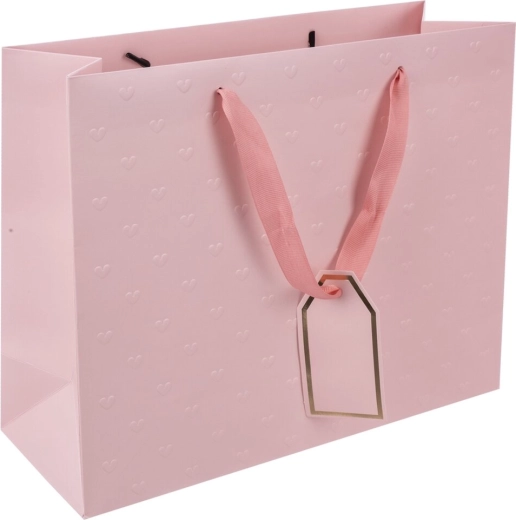Dāvanu papīra maisiņš rozā krāsā ar reljefām sirsniņām 31 × 12 × 26 cm