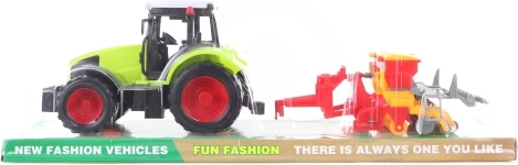 Plastmasas traktors ar sējmašīnas piekabi