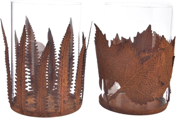 Decorative glass and metal candle holder with a leaf motif in a rust color