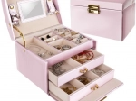 Pink satin jewelry box with key and mirror